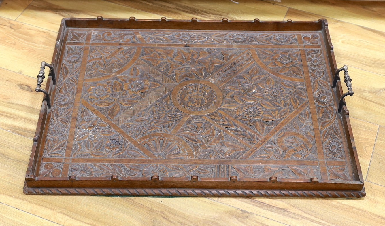A Victorian carved oak tray, 50 x 66cm